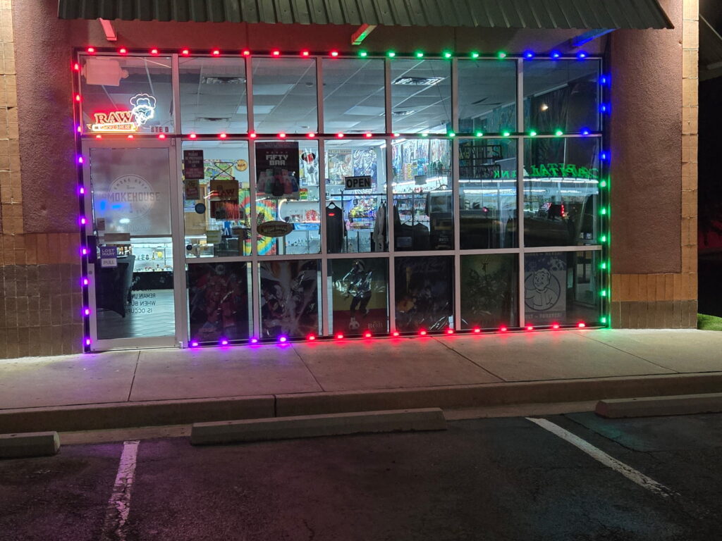 Storefront display window outlined in smart RGB lights controlled via mobile app
